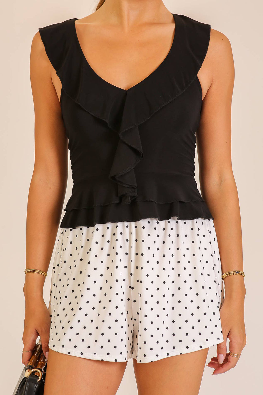 Ruffle Trim Sleeveless Peplum Top: Black