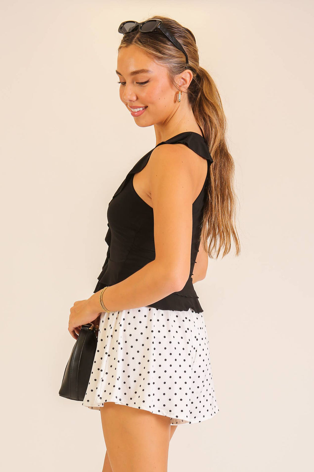 Ruffle Trim Sleeveless Peplum Top: Black